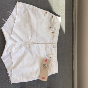 501 Levi’s high rise white jean shorts